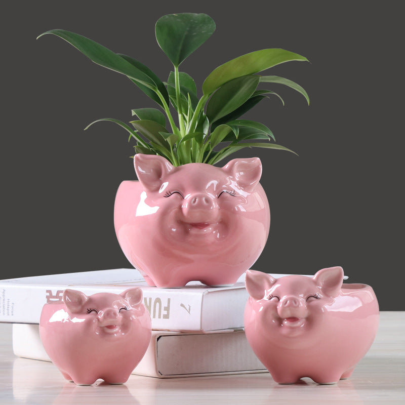 Ceramic animal flower pot group display