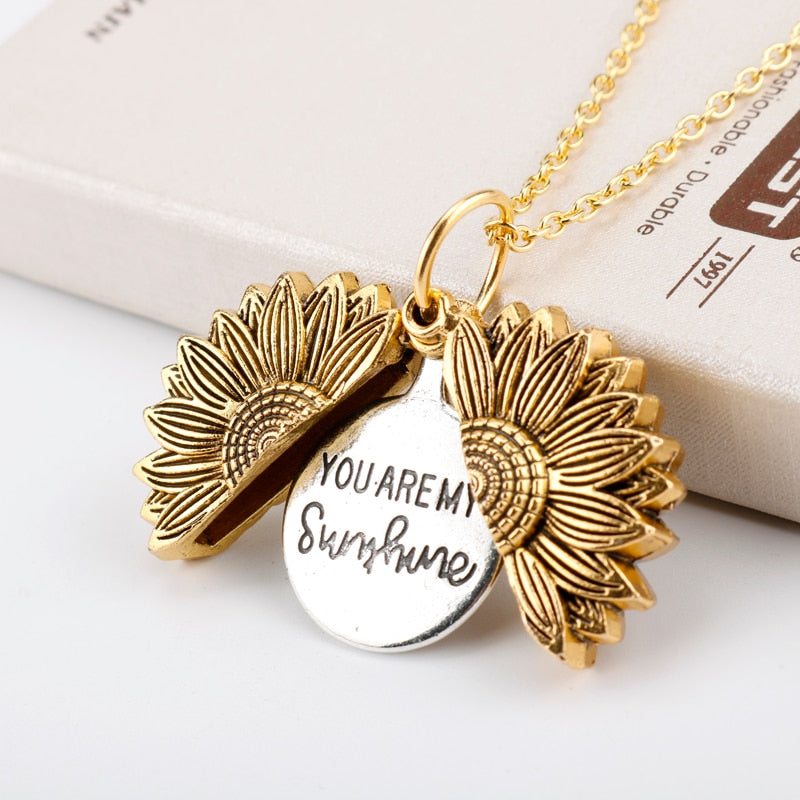 Sunflower pendant necklace, angle view