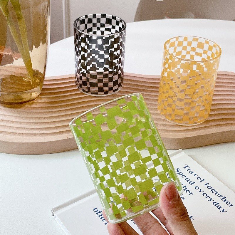 Nordic plaid glass cup in use