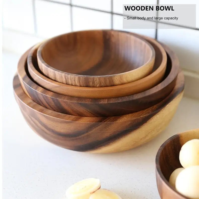Wooden bowl set with utensils
