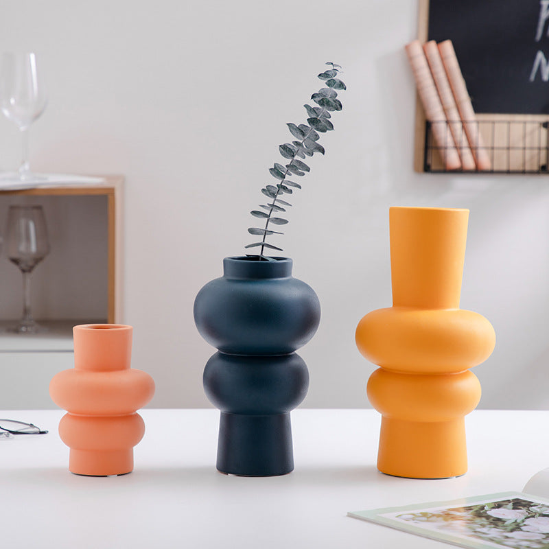 Ceramic vase shown in living room decor setting